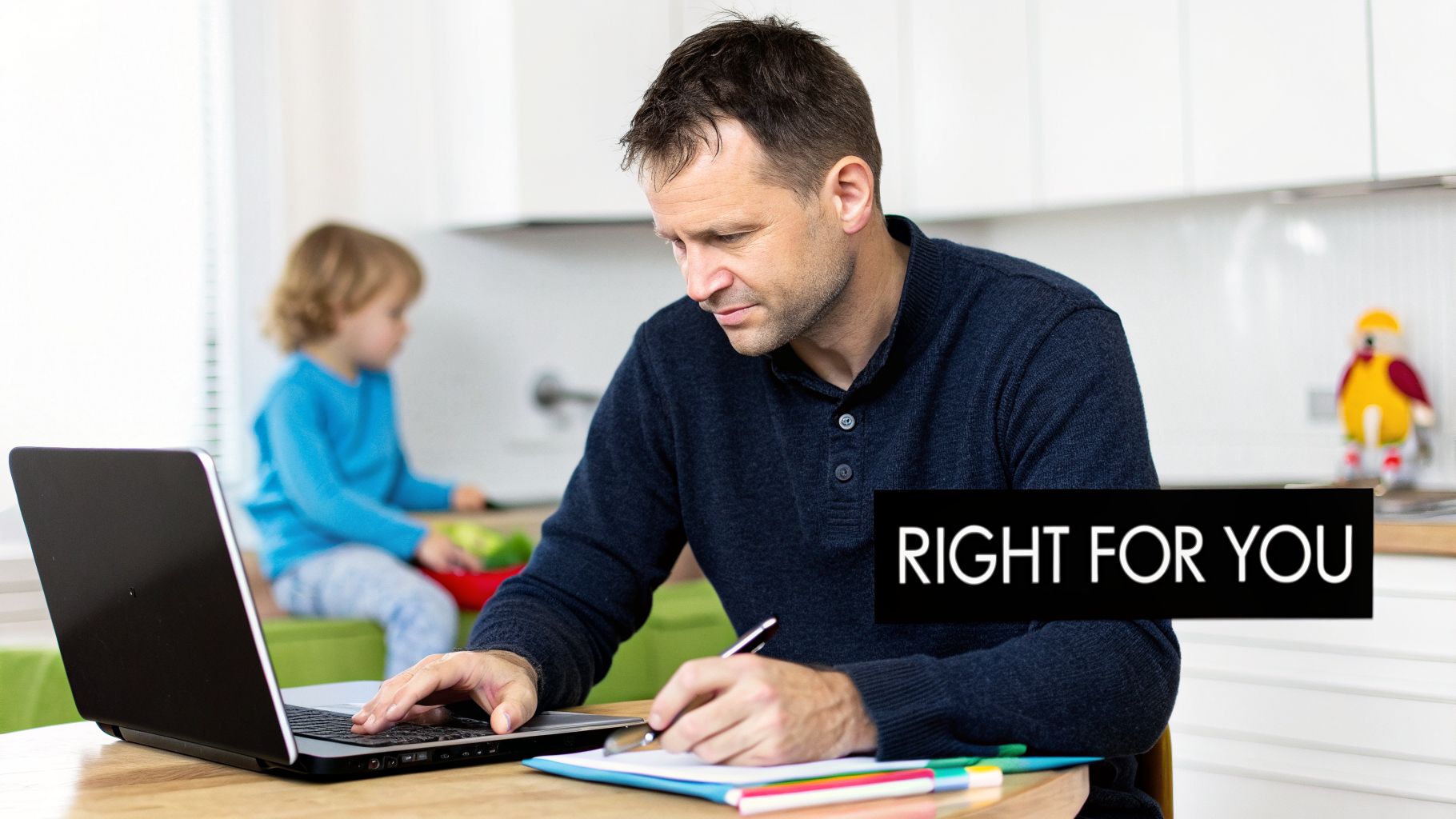 Man working from home on a laptop and writing notes, with a child in the background.