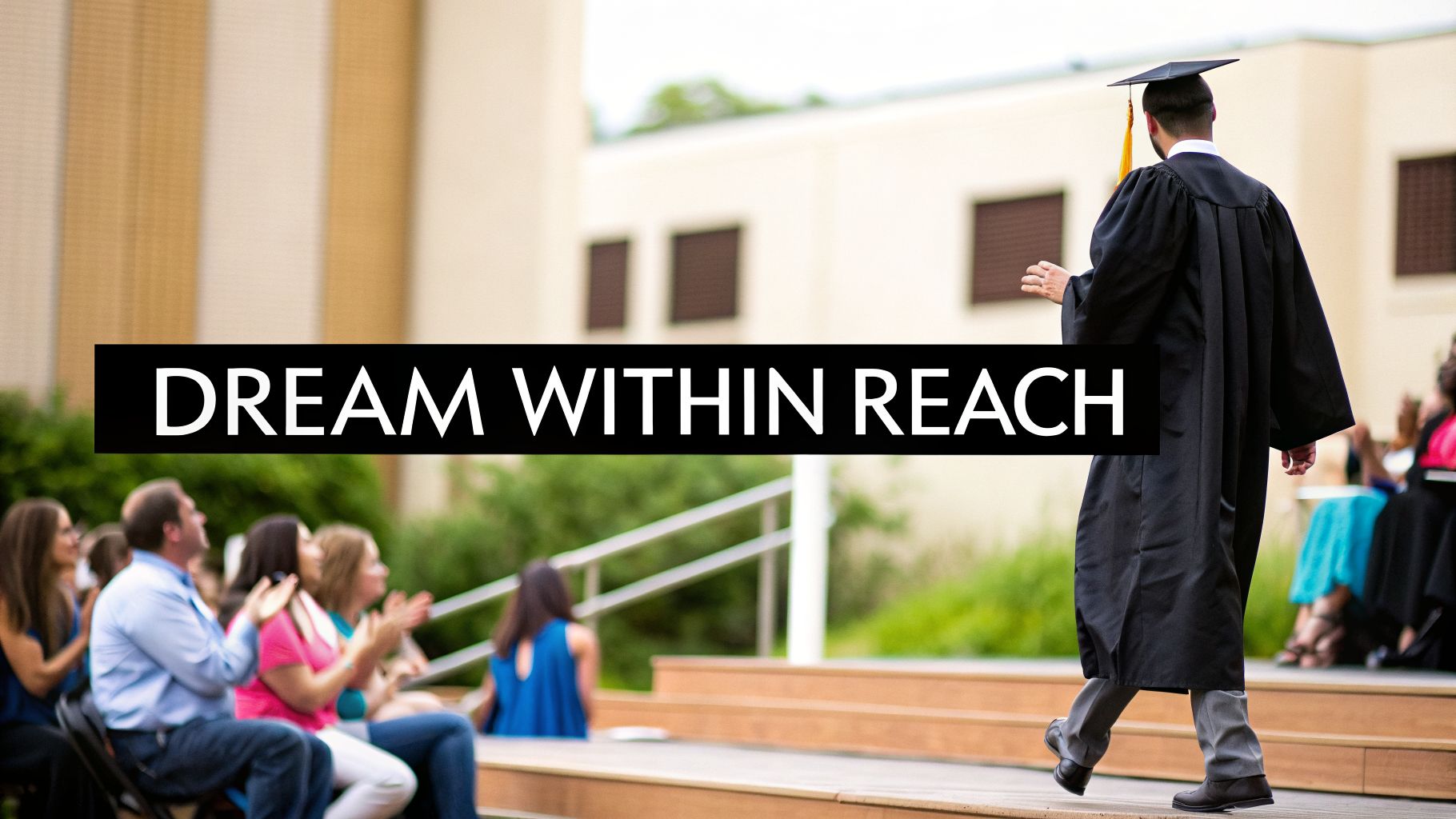 A graduate in a cap and gown walks on stage while an audience claps during a ceremony, with text 'DREAM WITHIN REACH'.