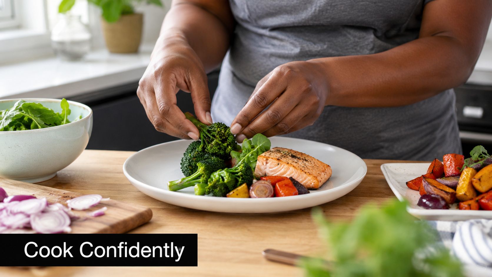 A person carefully arranging healthy grilled salmon and steamed broccoli on a dinner plate in a kitchen.
